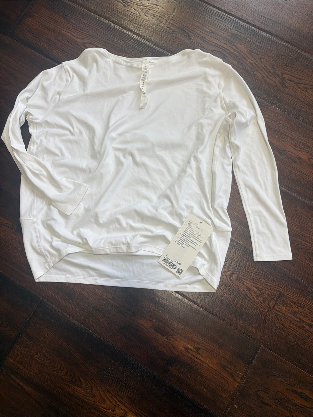 Lululemon Women's White Long-Sleeve Back in Action Nulu Top